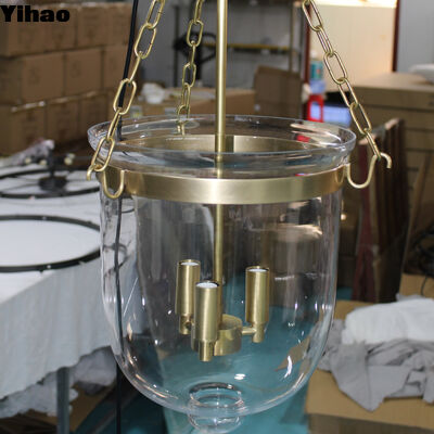 ซื้อ Yihao Factory Direct Brass Frame Crystal Shade Pendant Light with 3500K Warm White LED สําหรับโรงแรมและห้องนั่งเล่น การผลิตออนไลน์